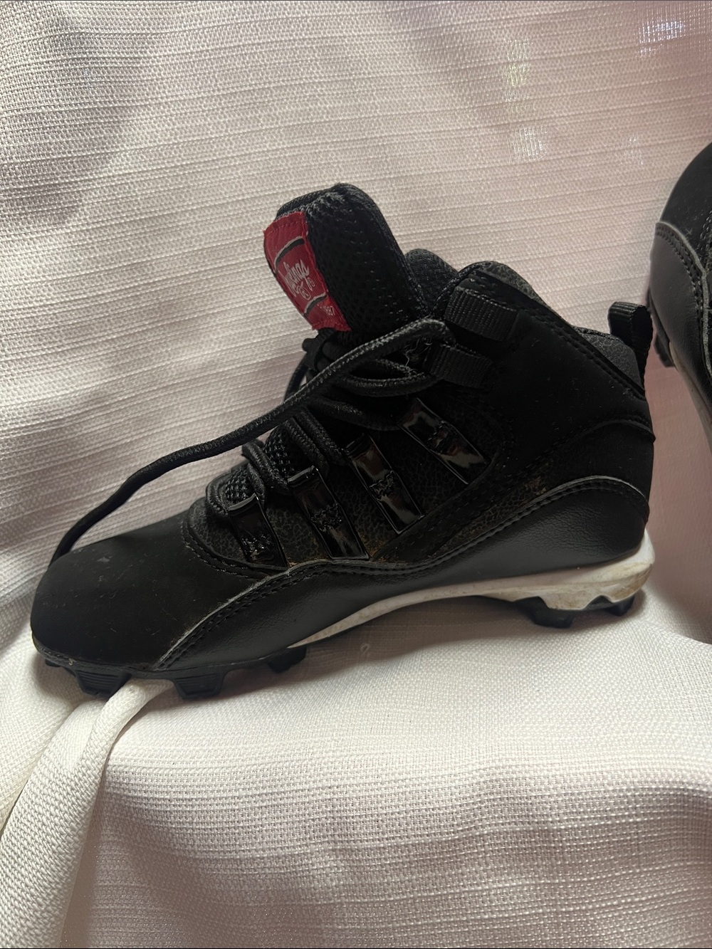Rawlings Black Youth Baseball Cleats with Red Accent - Picture 3 of 3